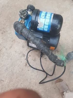 Water Pump and 1000L Roto Tank