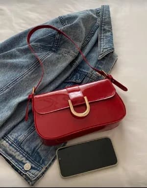 Shoulder sling bag with golden accent