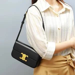Shoulder sling bag with golden accent