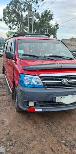 Red Toyota Van 2011