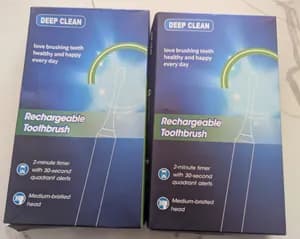 Deep clean electric toothbrush with 4 toothbrush heads