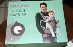 Multi functional baby carrier with hip seat