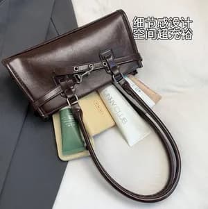 Shoulder bag with buckle details