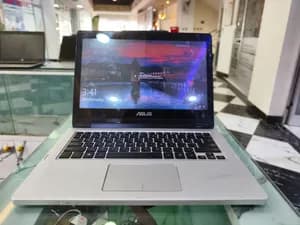 Asus 360° laptop 4GB RAM 500GB 14in