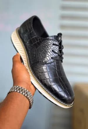 ቆዳ ጫማ