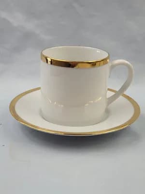 Vintage white ceramic demitasse cup and saucer set