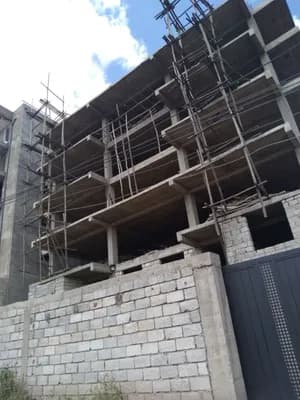 Unfinished Apartment Building for Sale