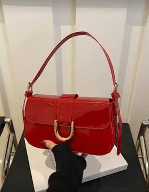 Shoulder sling bag with golden accent
